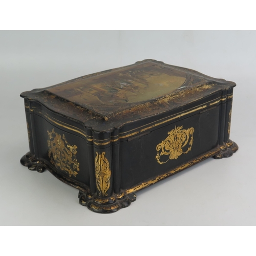 1205 - A Victorian papier-mache sewing box, of rectangular outline,  the hinged lid decorated with a contin... 