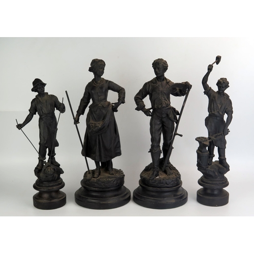 1208 - A pair of allegorical spelter figures depicting agriculture, mounted on ebonised circular bases, 43c... 