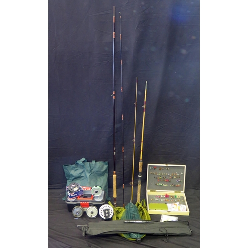 1224 - A collection of trout fishing equipment -  includes two carbon fibre rods, five centre pin reel, spa... 