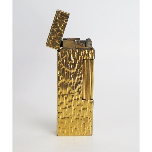 1224A - A gold plated Dunhill 70 lighter, with bark design, cased.