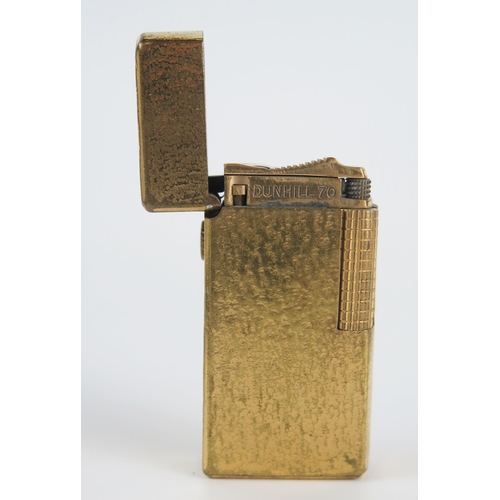 1225 - A gold plated Dunhill 70 lighter, with bark design, cased.