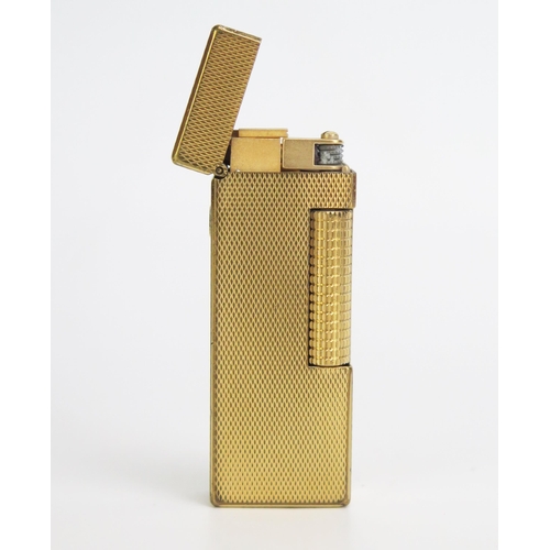 1225A - A gold plated Dunhill 70 lighter, with engine turned decoration.