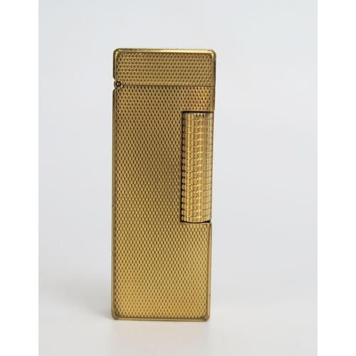 1225A - A gold plated Dunhill 70 lighter, with engine turned decoration.