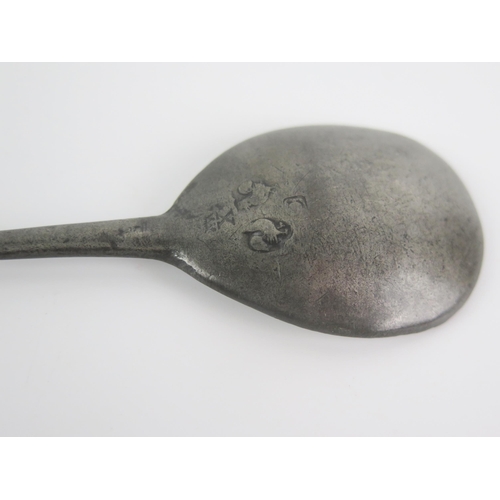 1235 - An 18th century pewter seal top spoon, with pear-shaped bowl and slender stem, bears worn touch mark... 