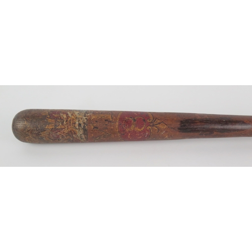 1239 - A Victorian turned wooden truncheon, with polychrome Royal cypher, 42cm long.