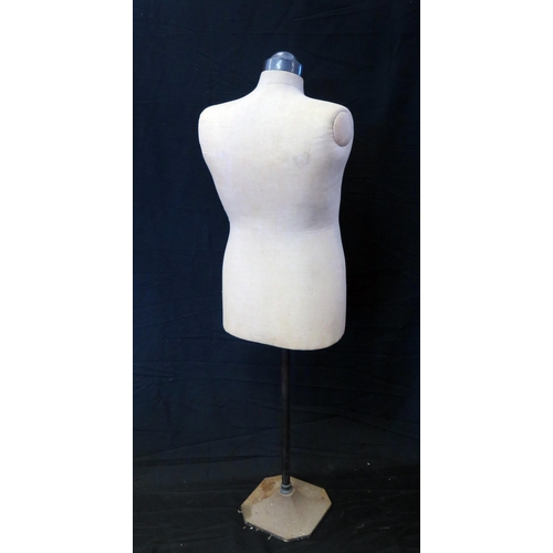 1242 - A Vintage anodised metal and linen covered shop mannequin, on an adjustable column and square base.