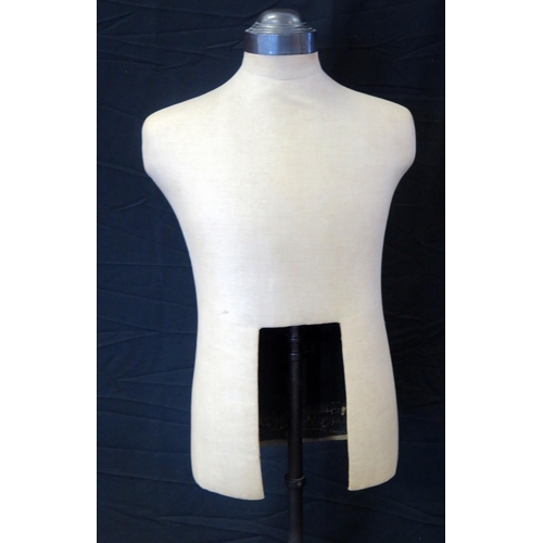 1243 - A Vintage anodised metal and linen covered shop mannequin, on an adjustable column and square base.