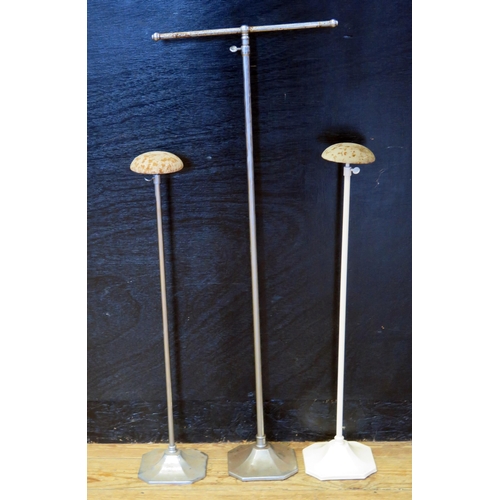 1245 - Two vintage adjustable hat stands, together with an adjustable scarf stand. (3)