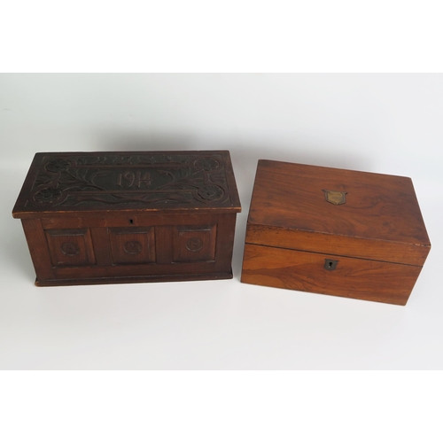 1280 - A carved mahogany panelled box, the rectangular hinged lid with flowerhead decoration dated 1914, 30... 