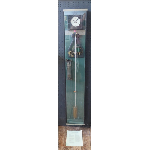 1281 - An ECS (Smiths) electric master clock, with pendulum contained in a glazed case, 147cm high.