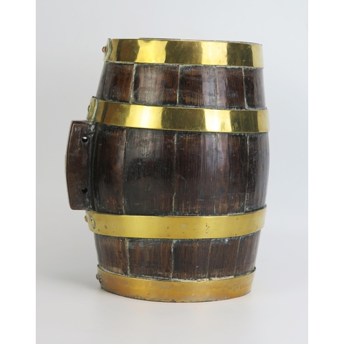 1293 - A 19th century oak and brass bound firkin of coopered construction with brass bands, 24cm long.