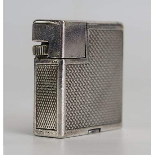 1296 - Alfred Dunhill vintage Paris Savory Silver Plate petrol Lighter, with engine turned decoration, seri... 