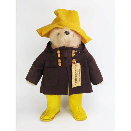 1335B - Gabrielle Designs Paddington Bear in brown coat, yellow  hat and boots, with tag