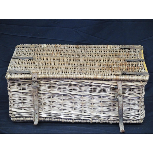 1350 - A wicker laundry hamper, with hinged lid  and leather retaining straps, 70cm wide.