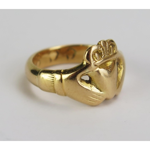 137 - A Victorian Precious Yellow Claddagh Ring engraved to inner shank 'HCC 91', size K, KEE tested as 15... 