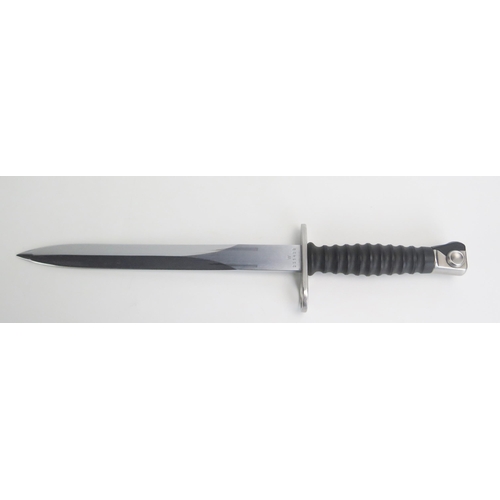 1378 - A Swiss Army bayonet, with 24cm double-edged blade, ribbed grip contained in a metal sheath with lea... 