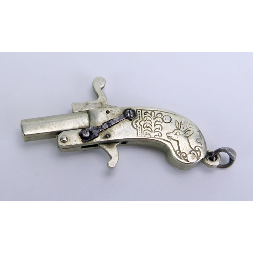 1391 - An early 20th century miniature pistol, obsolete calibre, 4cm long.