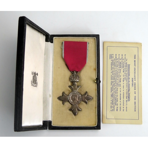 1396 - A George V M.B.E. (Civil) contained in its original case with paperwork.