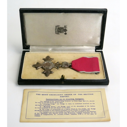 1396 - A George V M.B.E. (Civil) contained in its original case with paperwork.