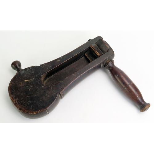 1398 - A World War One period wooden rattle for gas attacks, with turned wood handle, 24cm long.