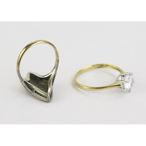 146 - A 14ct Gold and CZ Solitaire Ring, size T.25, 2.33g gross and a 9ct Gold and Silver Ring, size M.5, ... 