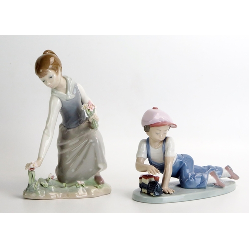 1498 - A Lladro figure 'All Aboard' 18cm long, and 'Flower Girl, 21cm high, both boxed.