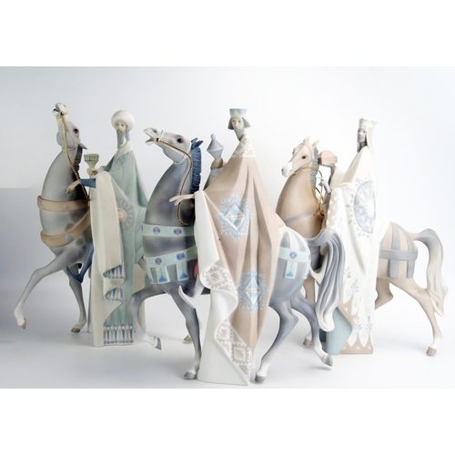 1500 - Lladro  porcelain Three Wise Men on horseback, matt finish, each 41cm high. (3). One horse leg damag...