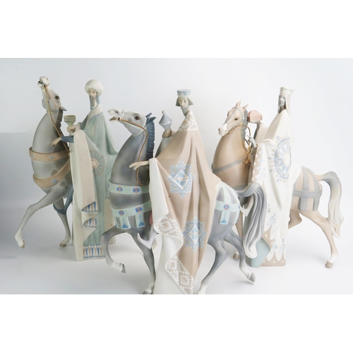 1500 - Lladro  porcelain Three Wise Men on horseback, matt finish, each 41cm high. (3). One horse leg damag... 