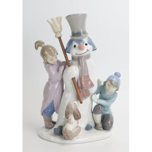 1501 - A Lladro porcelain figure group The Snow Man,  No. 5713, 20.5cm high, boxed