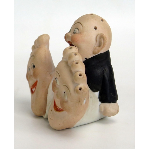 1503 - A Schafer & Vater bisque porcelain novelty 'Big Feet' ashtray, the figure with open mouth pierced he... 