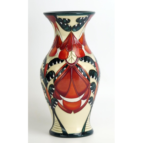 1522 - A Moorcroft pottery vase, 'Temple of The Sun' decoration by Paul Hilditch, released in 2009, 19.5cm ... 