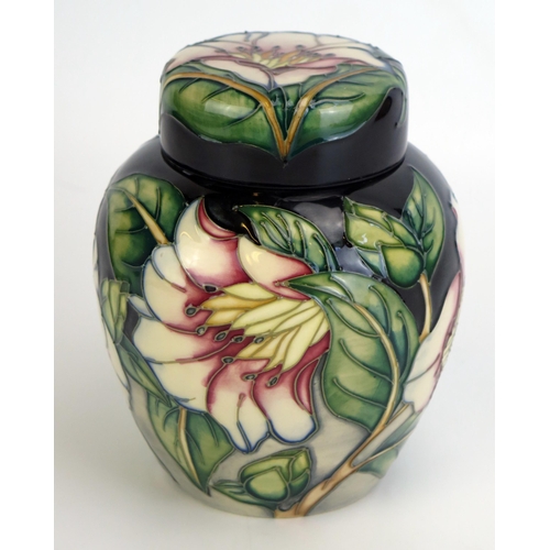 1523 - A Moorcroft pottery ginger jar and cover, with 'Cavendish' pattern by Philip Gibson, released in 200... 