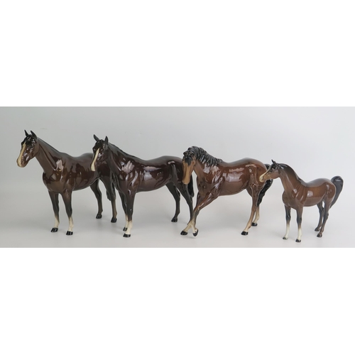 1525 - Four assorted Beswick stallions, various sizes, gloss finishes, (4).