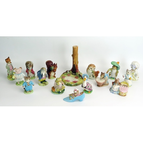 1543 - A collection of Beswick Beatrix Potter figurines, with gold backstamps, includes Timmy Tiptoes, Squi... 