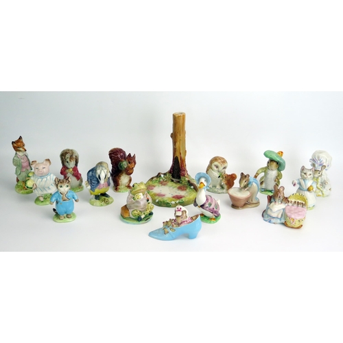 1543 - A collection of Beswick Beatrix Potter figurines, with gold backstamps, includes Timmy Tiptoes, Squi... 