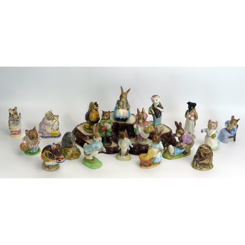 1545 - A collection of Beswick Beatrix Potter figurines, with brown backstamps, includes Peter Rabbit, Tabi... 