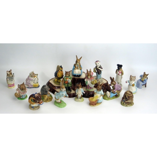 1545 - A collection of Beswick Beatrix Potter figurines, with brown backstamps, includes Peter Rabbit, Tabi... 