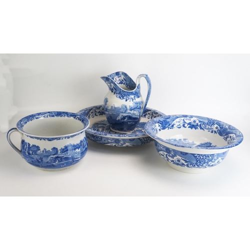 1555 - A Spode blue and white 'Italian' pattern toilet set including wash basin, water jug, chamber pot and... 