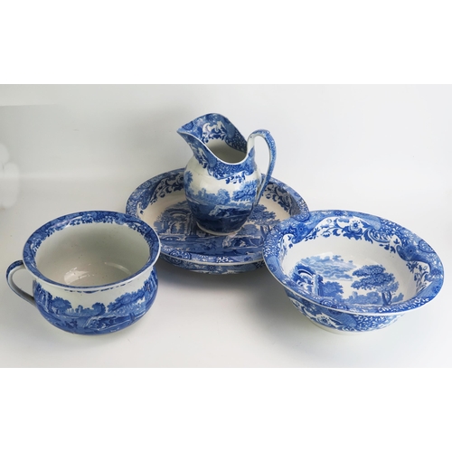 1555 - A Spode blue and white 'Italian' pattern toilet set including wash basin, water jug, chamber pot and... 