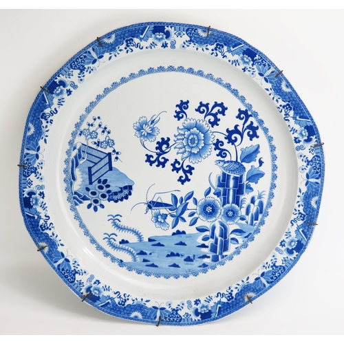 1556 - A large Copeland late Spode blue and white 'Grasshopper' pattern charger, 51cmk diameter.