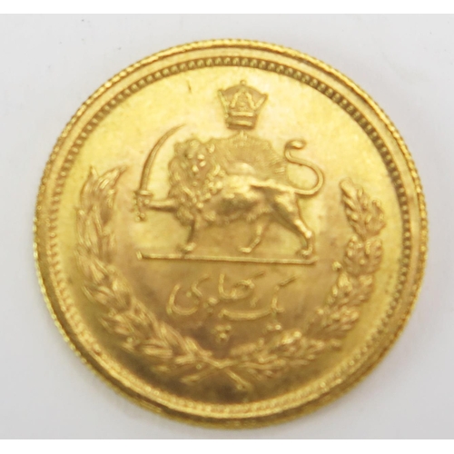 1593 - An Iranian 1 Pahlavi Mohammed Reza Shah Gold Coin, 8.13g (7.317g of pure gold)