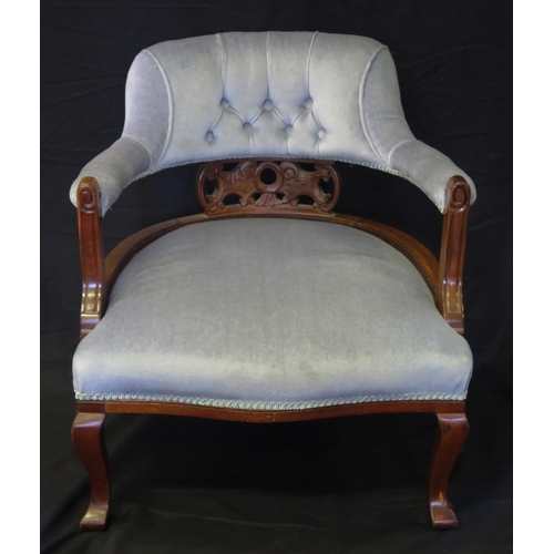 1600 - An Edwardian mahogany salon chair, with stuff-over rail back, with stuff over seat raised on swept f... 