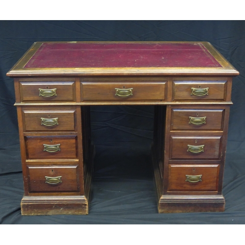 1602 - An Edwardian mahogany twin pedestal writing desk, the top with tooled leather writing surface, with ... 