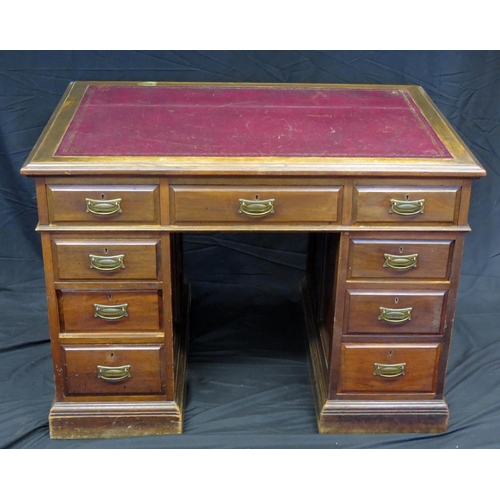 1602 - An Edwardian mahogany twin pedestal writing desk, the top with tooled leather writing surface, with ... 