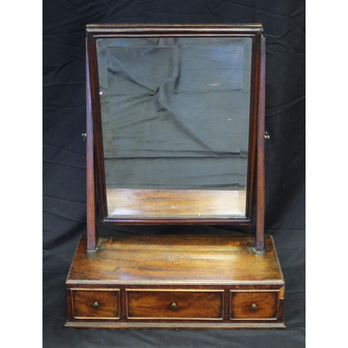 1603 - A late Georgian mahogany toilet mirror, with rectangular bevelled mirror plate, on a box base with t... 