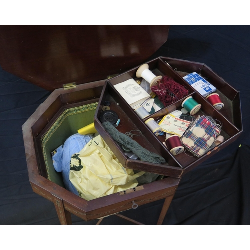 1604 - A satinwood and painted sewing table, of octagonal outline, the hinged lid with painted husk decorat... 