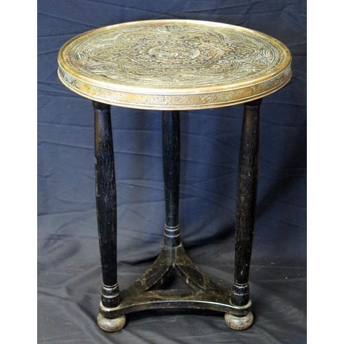 1607 - A Chinese brass topped occasional table, the circular top raised on three turned ebonised legs, 50cm... 