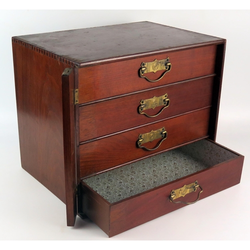 1624 - A stained beech collectors table top chest of four short drawers, with lockable stile, 37.5cm wide.