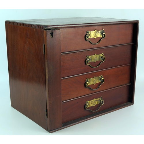 1624 - A stained beech collectors table top chest of four short drawers, with lockable stile, 37.5cm wide.