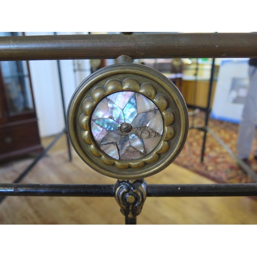 1636 - A Late Victorian tubular metal four-poster double bed, with bed ends, side rails and drapery runners... 